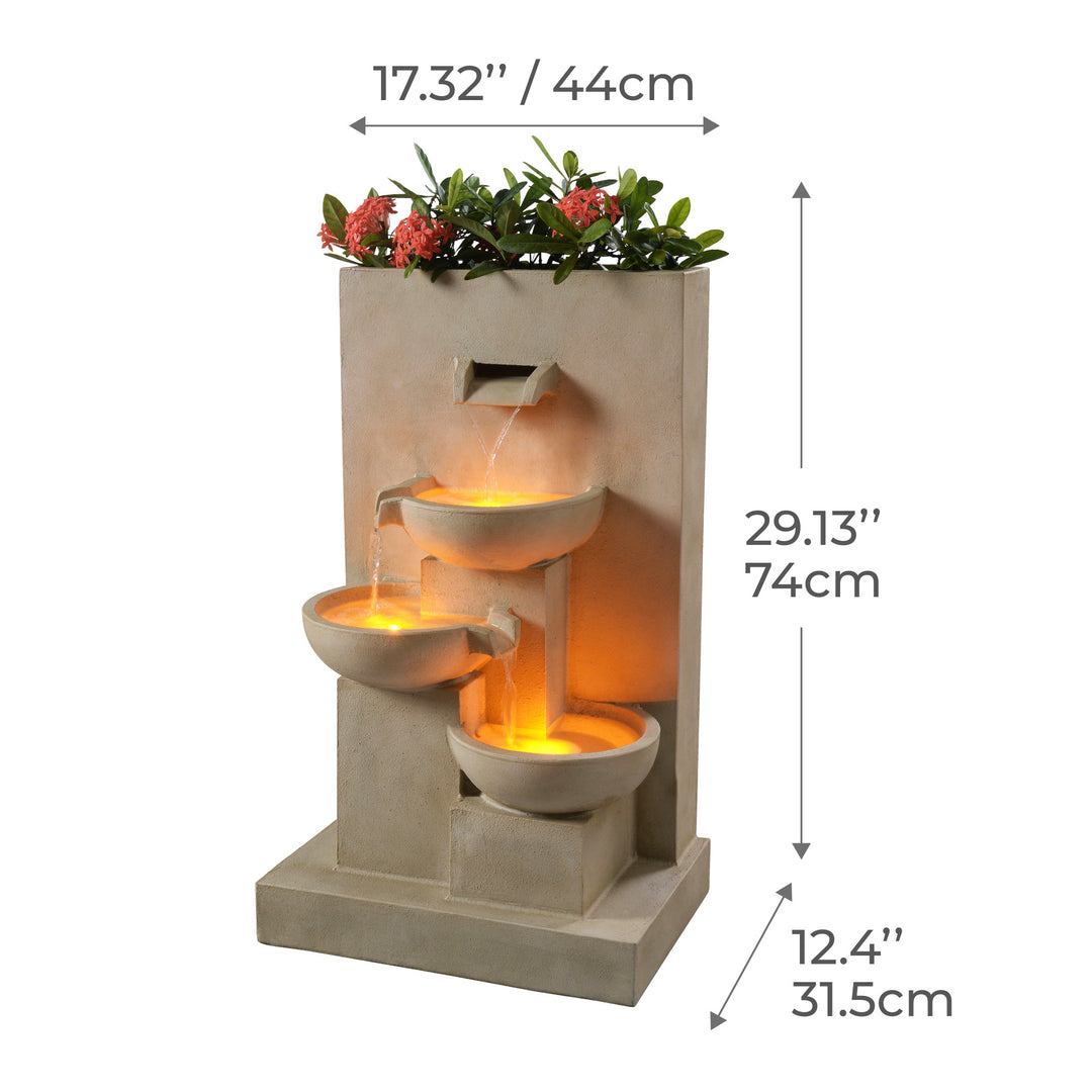 The dimensions listed in inches and centimeters for an outdoor water fountain with a planter box