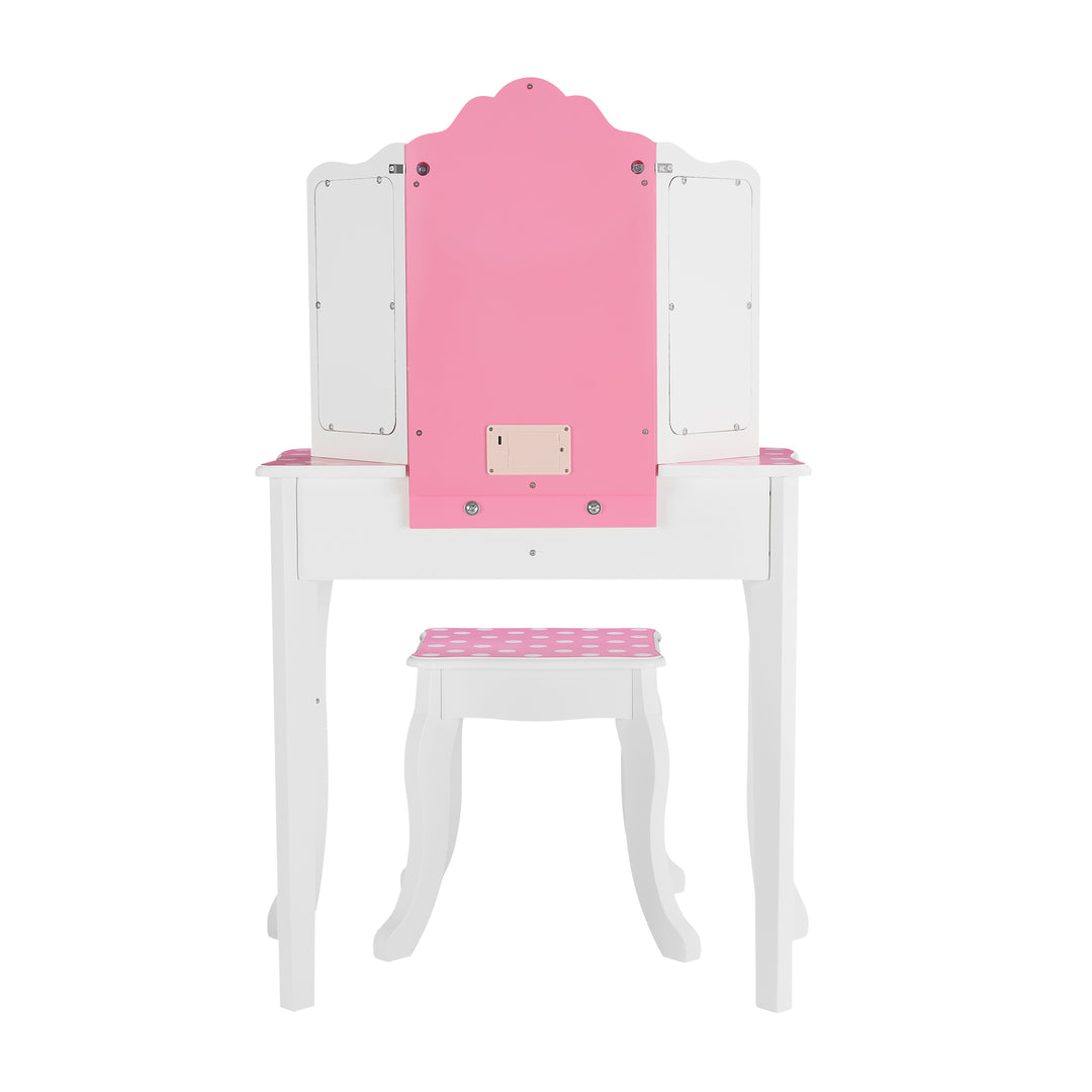 A white child's vanity set with pink and white polka-dotted accents from the back