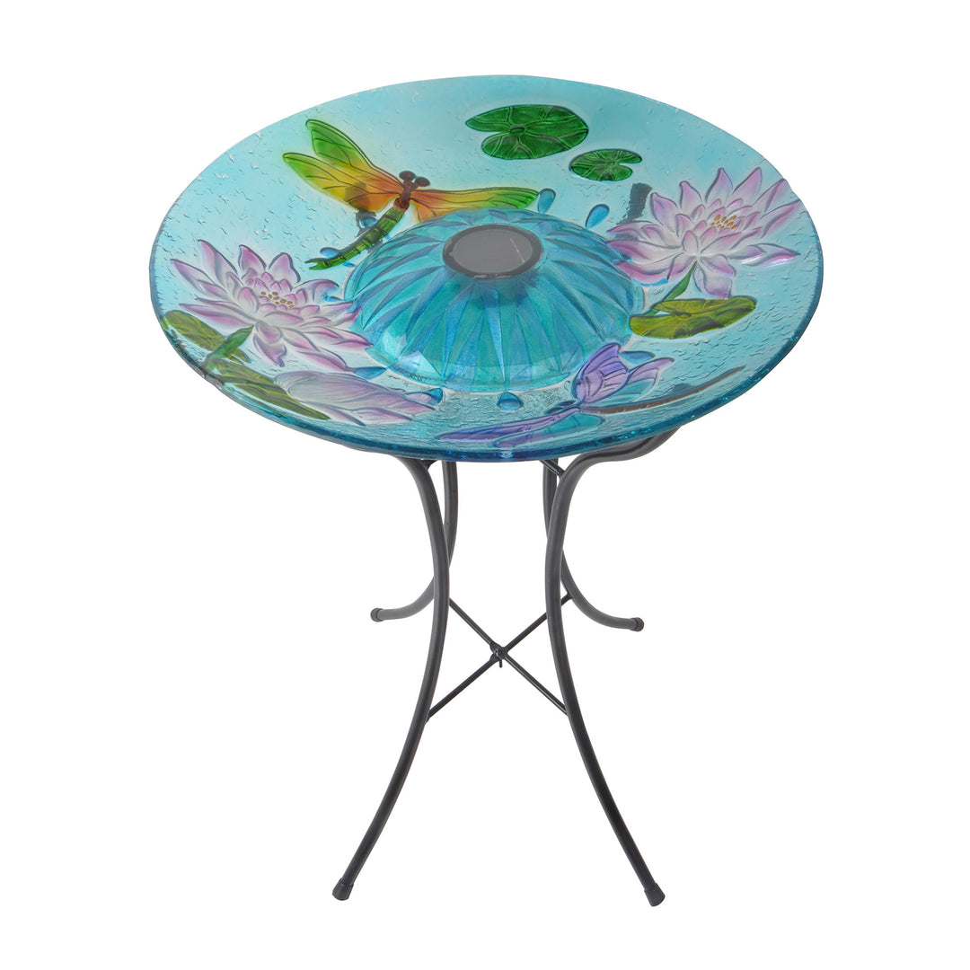 birdbath with dragonflies, lily pads and water flowers are featured on an iron stand