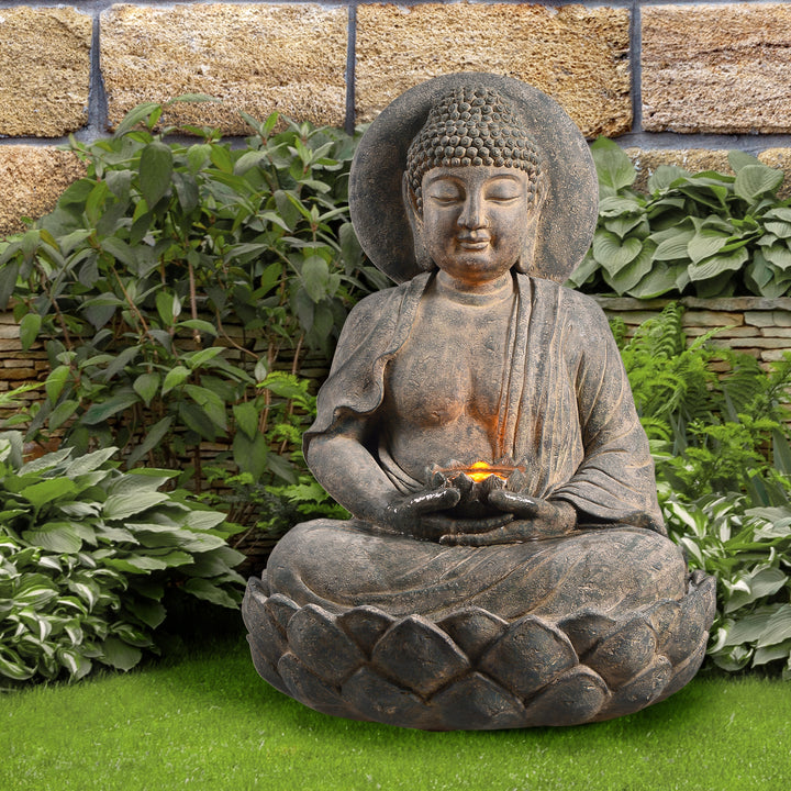 Buddha statue in a lush garden