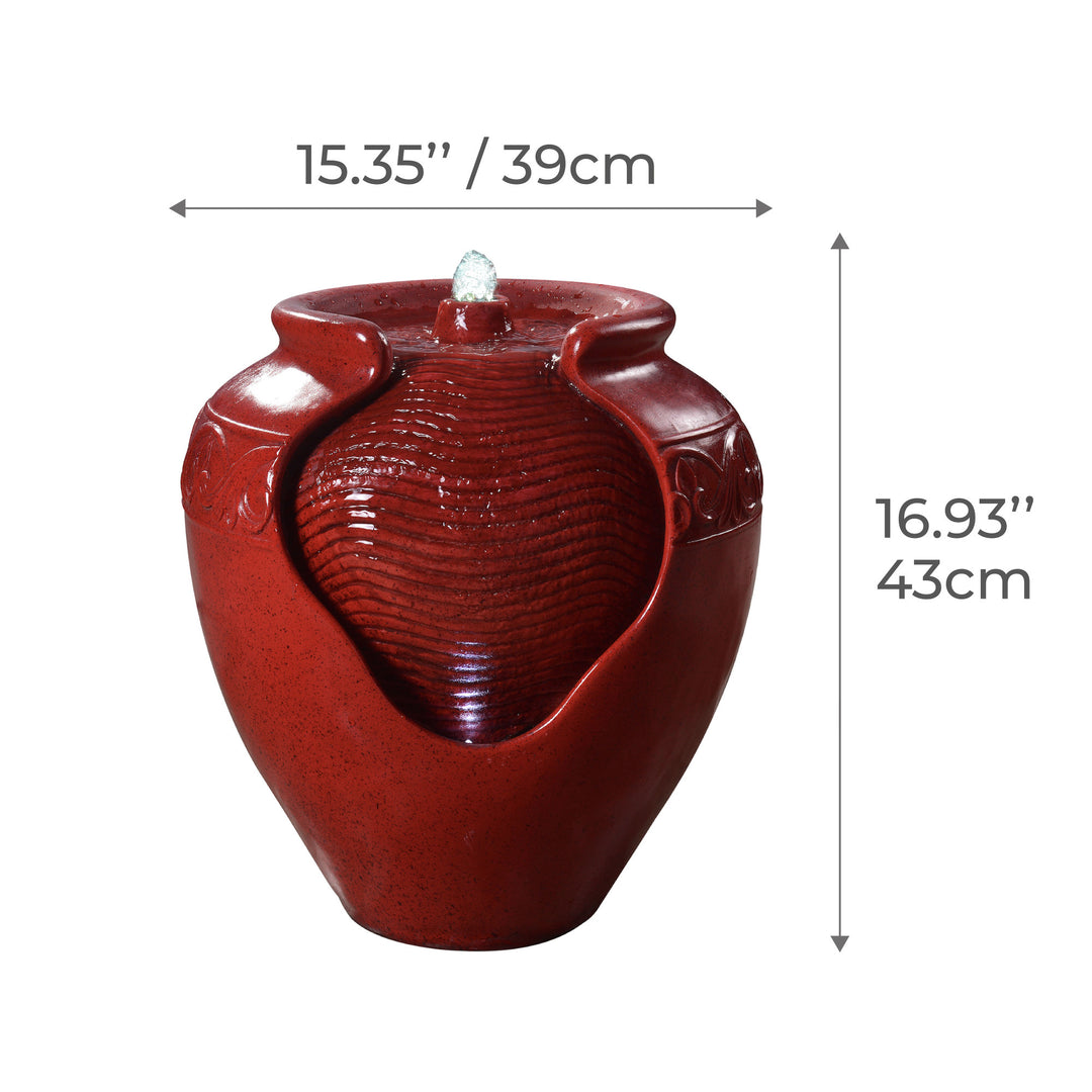 Dimensional graphic for a red vase-shaped water fountain in inches and centimeters