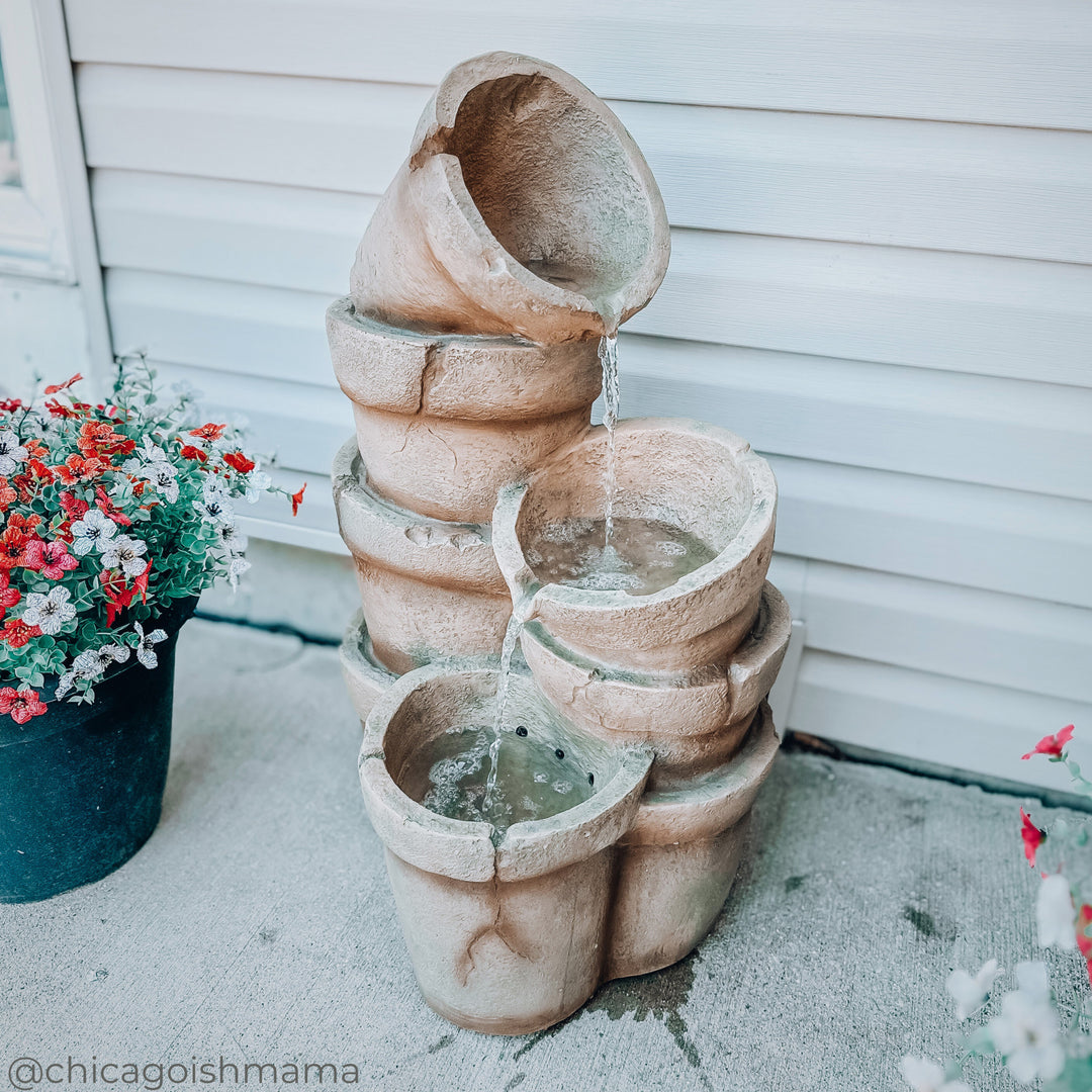 Influencer image of overflowing pots in a backyard, aged filter used.