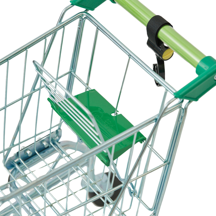 A fold down seat in a kid's play grocery cart