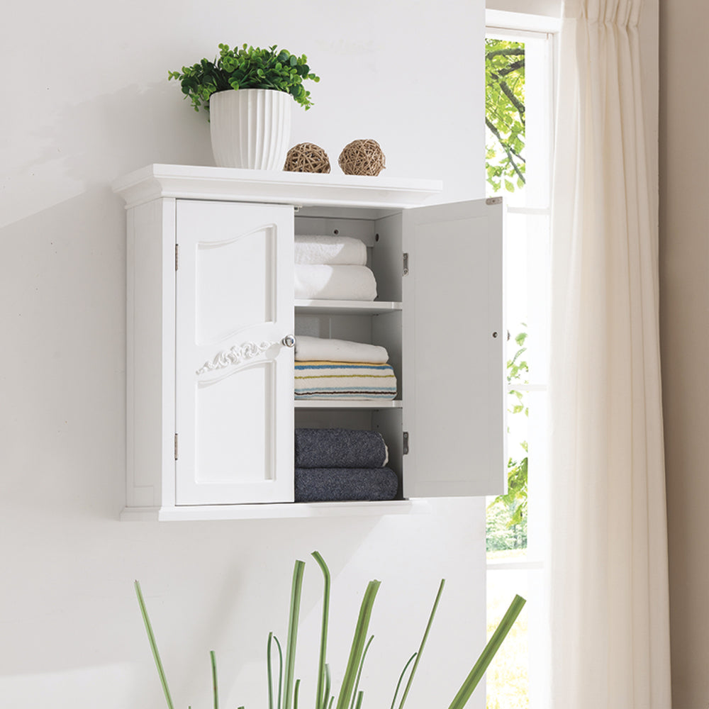 A two-door wall cabinet with decorative scrollwork and a door open