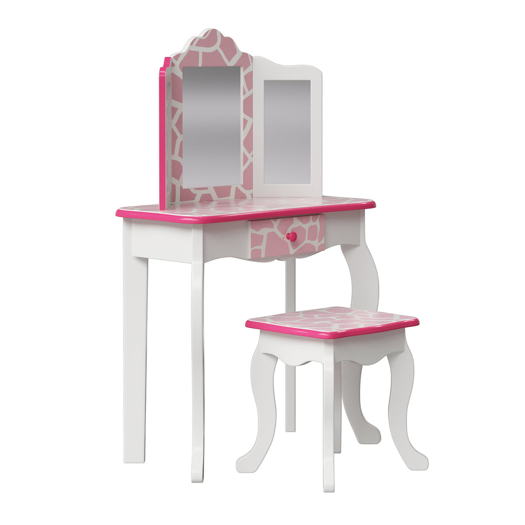 Sideview of a child's vanity set with a white finish with giraffe print