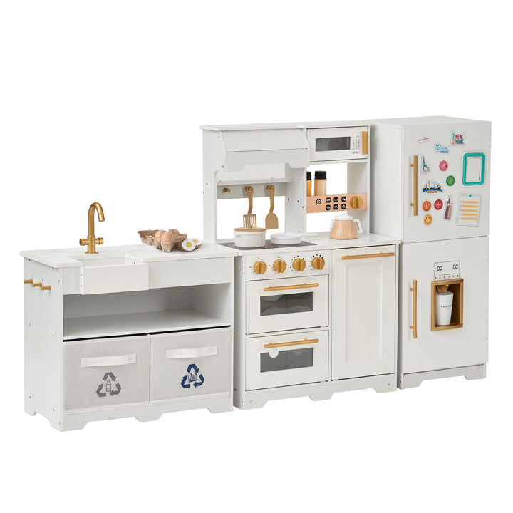 Teamson Kids Little Chef Atlanta modular play kitchen in white and gold and modern design, featuring a pretend stove, oven, microwave, refrigerator, and coffee maker, with accessories.