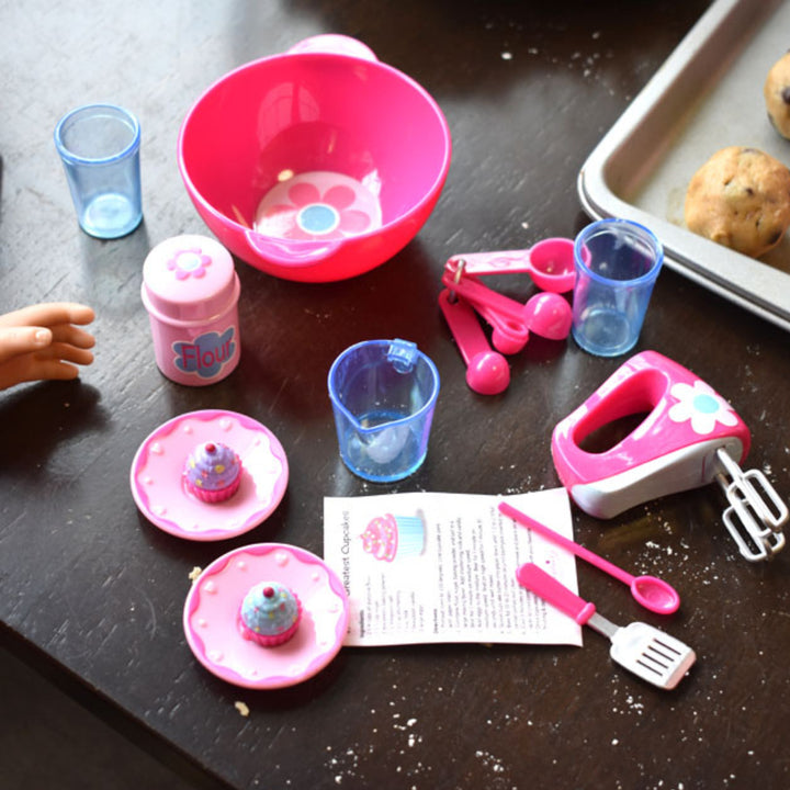 photo of the baking accessories on a table with cookie dough