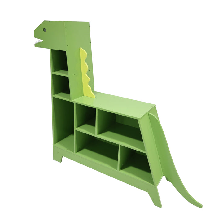 An angled view from behind and to the side of the Green dinosaur-shaped bookshelf for children's bedrooms with 7 compartments