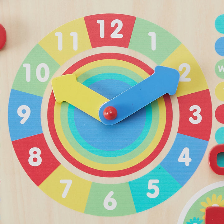 A colorful clock face with a pair of movable hands