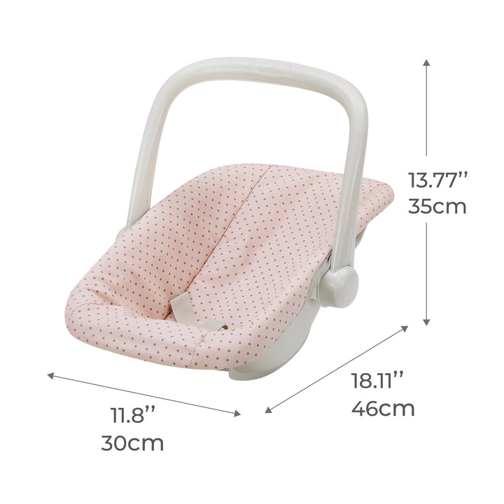 A baby carrier with a pink polka-dot fabric and white plastic handle. Dimensions are listed as 13.77" (35cm) in height, 18.11" (46cm) in length, and 11.8" (30cm) in width.
