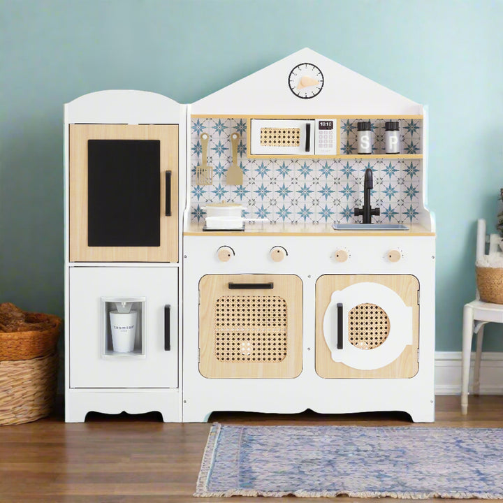 a bohemian style kids play kitchen is shown in a living room