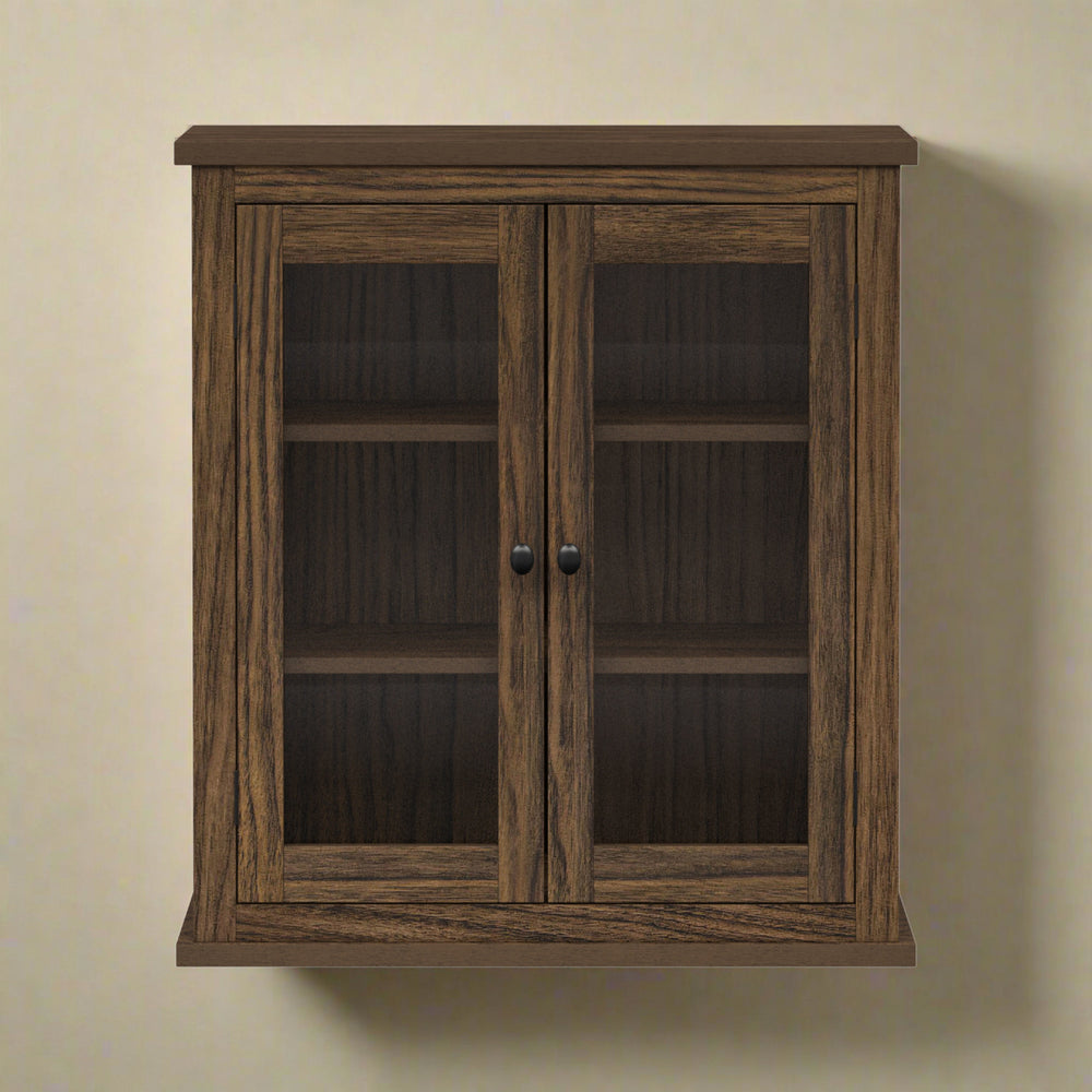 Two-door walnut finished wall cabinet hung on a tan wall.