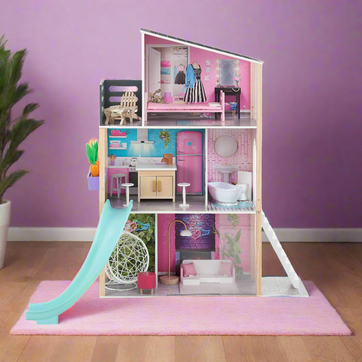 a modern, brightly colored dollhouse with a slide, fully furnished is displayed in a girly play room