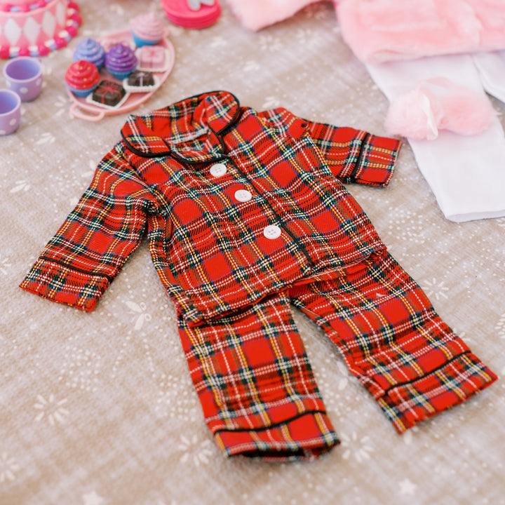 A set of red plaid flannel pajamas for an 18" doll