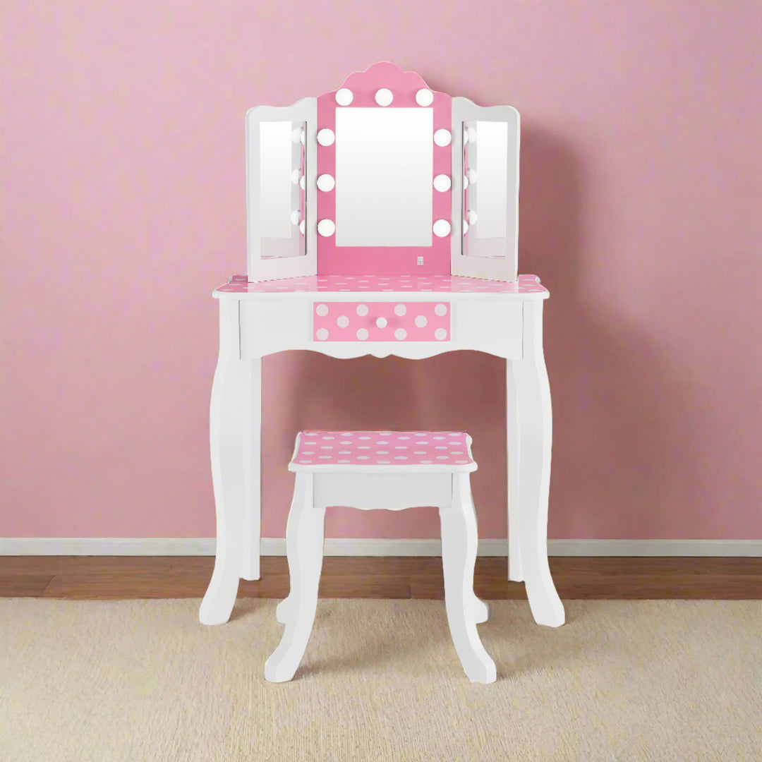 lit vanity in a pink bedroom for girls