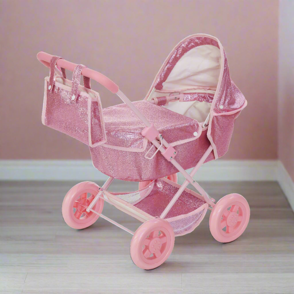 A pink glittery bassinet style stroller sits in a neutral colored play room