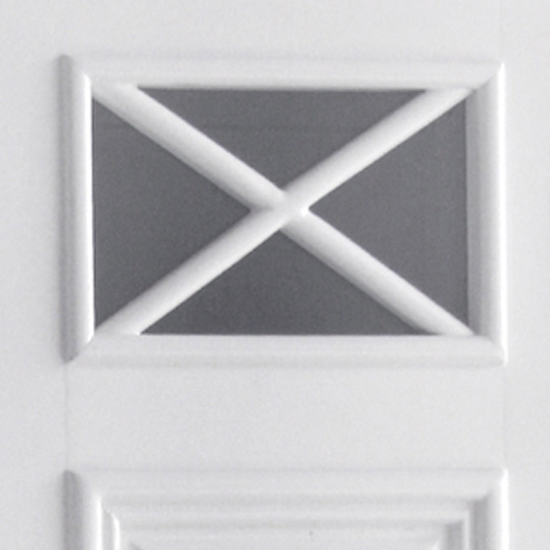 Close-up of a glass panel with cross molding on the door of a over-the-toilet cabinet