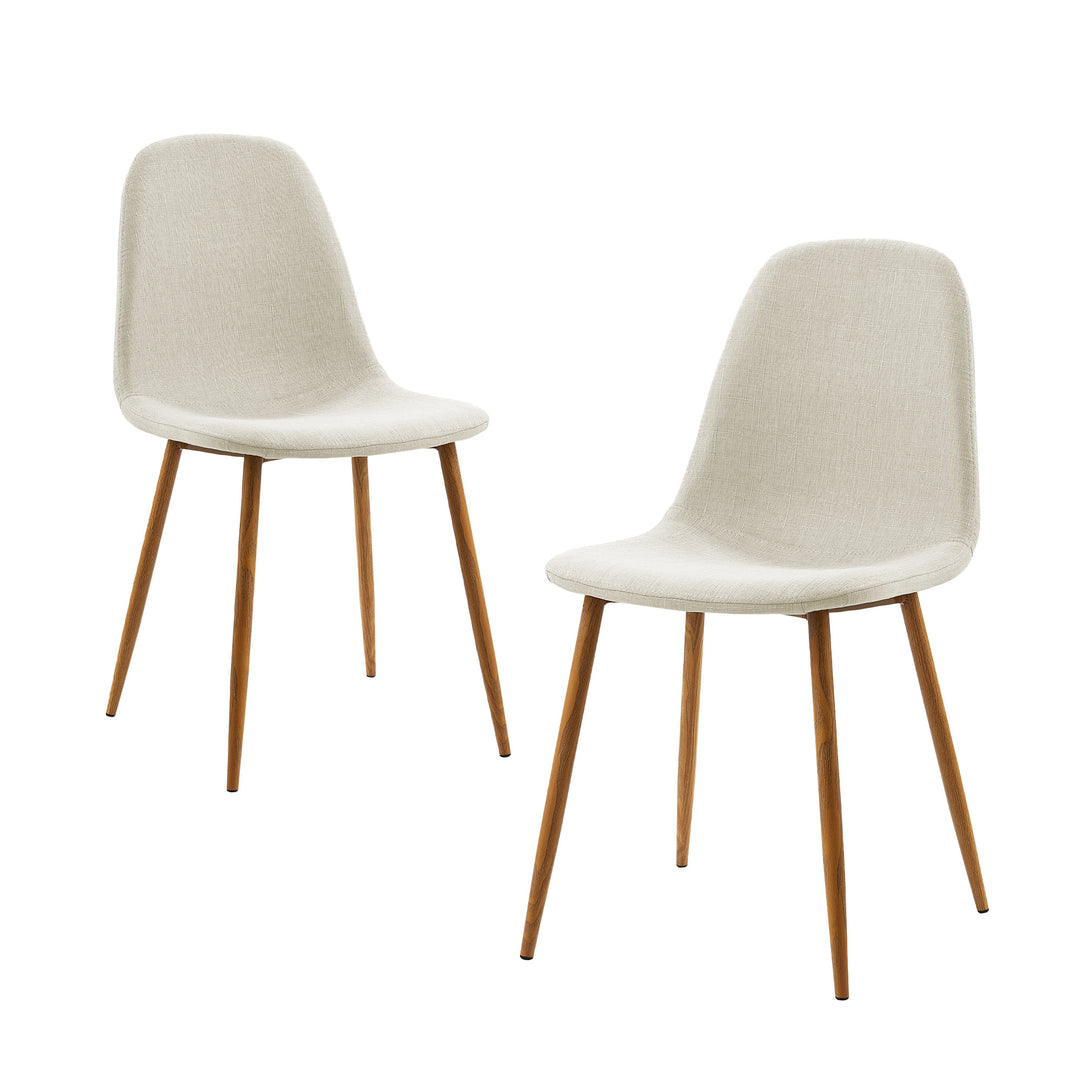 Two chairs with cream colored fabric and natural wood legs. 