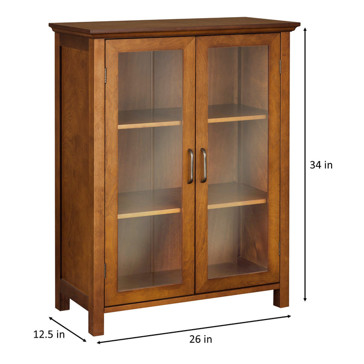 Dimensional graphic of a 2-door glass paneled floor cabinet in inches and centimeters