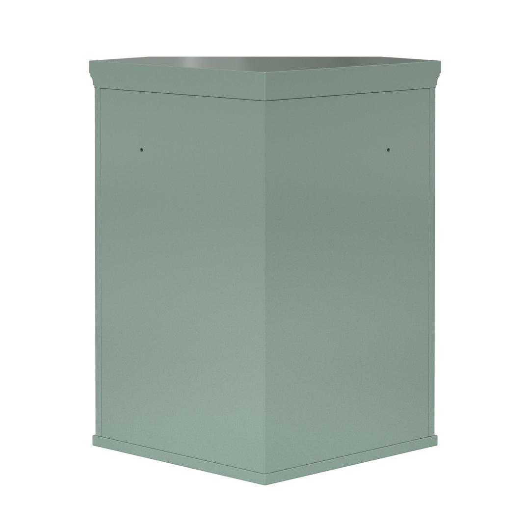 Back view of a sage green corner wall cabinet.