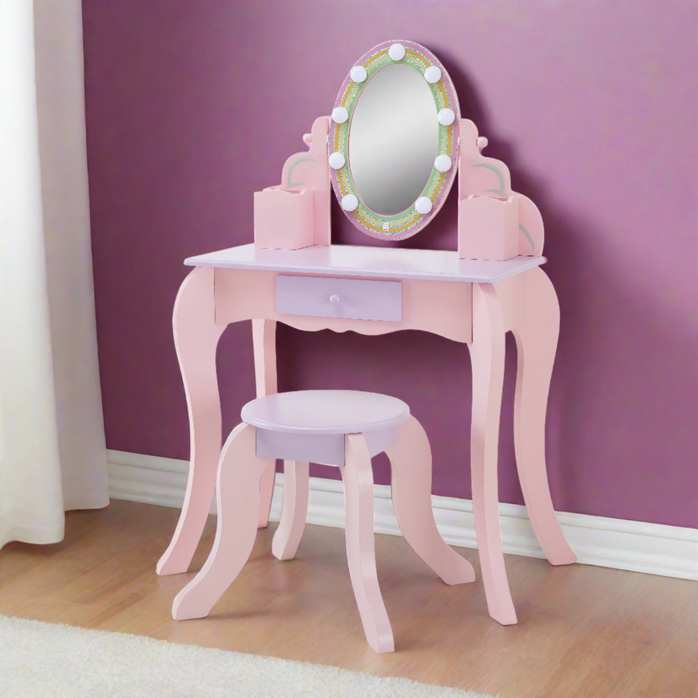 Fantasy Fields Little Princess Rapunzel Vanity with LED Illuminated Mirror against a purple wall