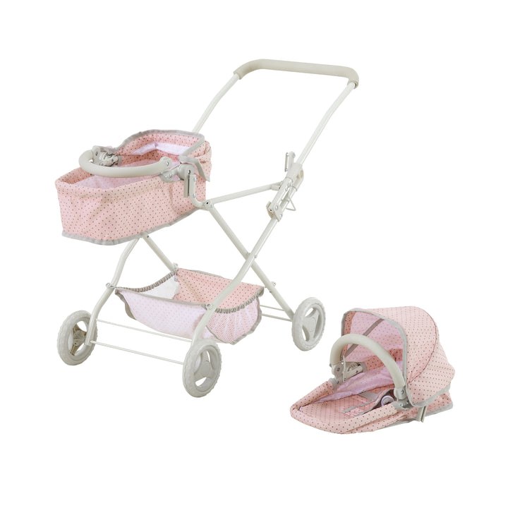 Double bassinet stroller, pink with gray polka-dotted material and white framework with one of the bassinets taken off