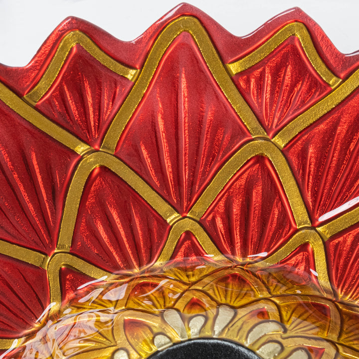 Closeup of the red and golden fused glass bowl and details