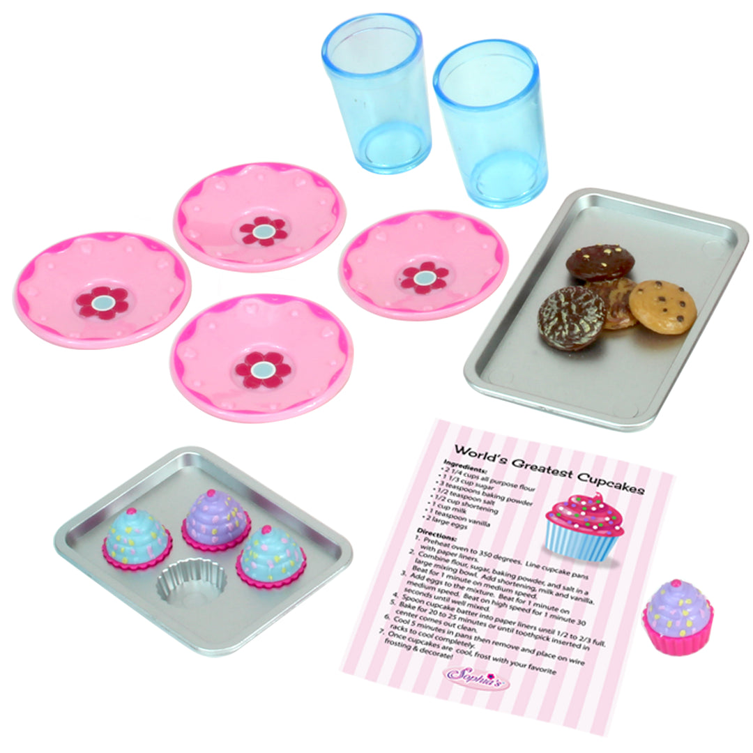 plates, cups, tray of cookies, cupcakes and a recipe card are shown