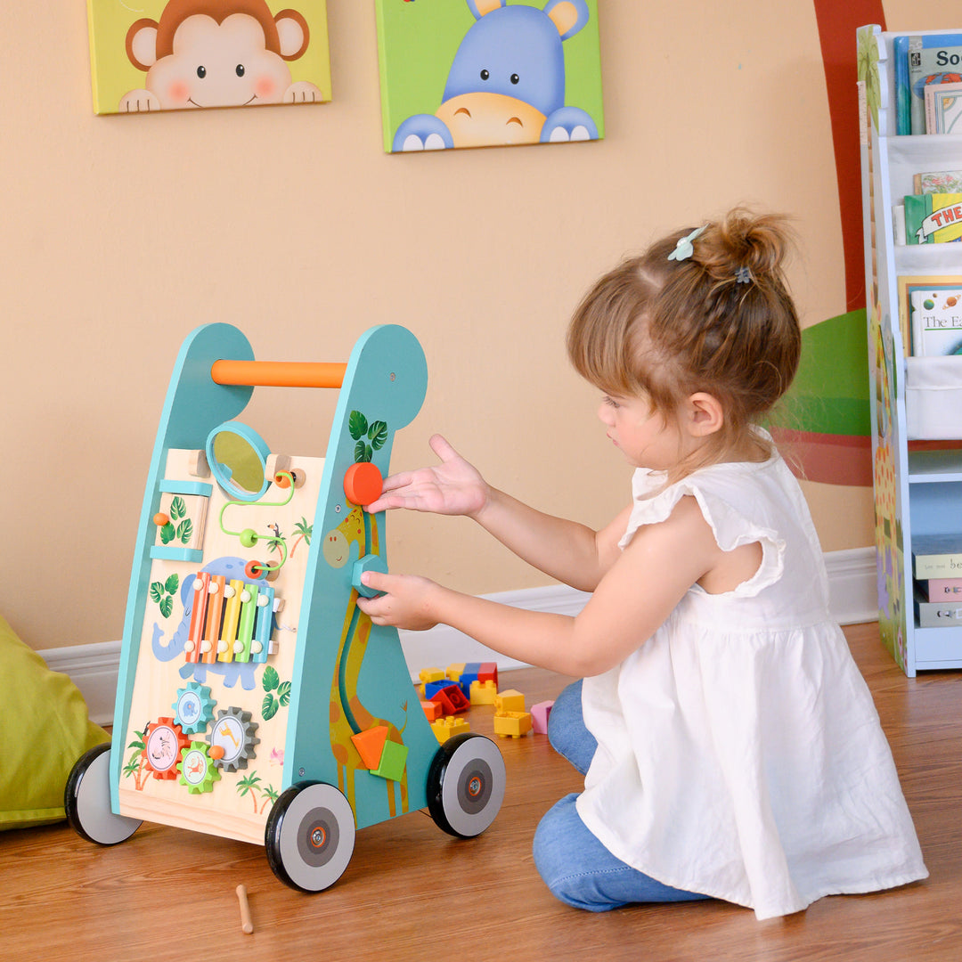 A young girl pushes a couple of colorful shapes up and down the side of the walker/