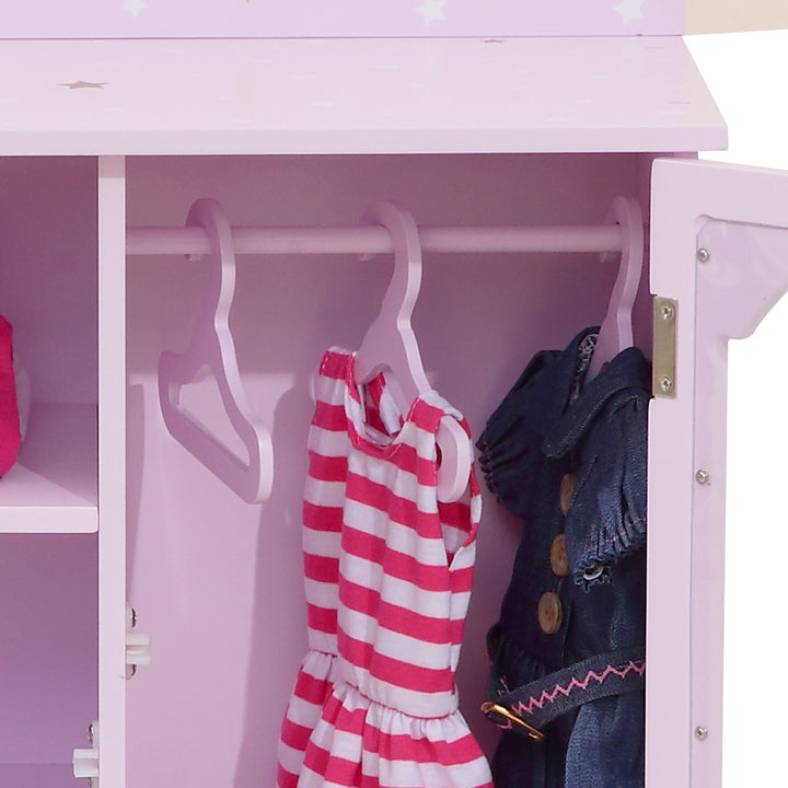 Close-up of three hangers, two with dresses for 18" dolls hanging, inside the double closet.