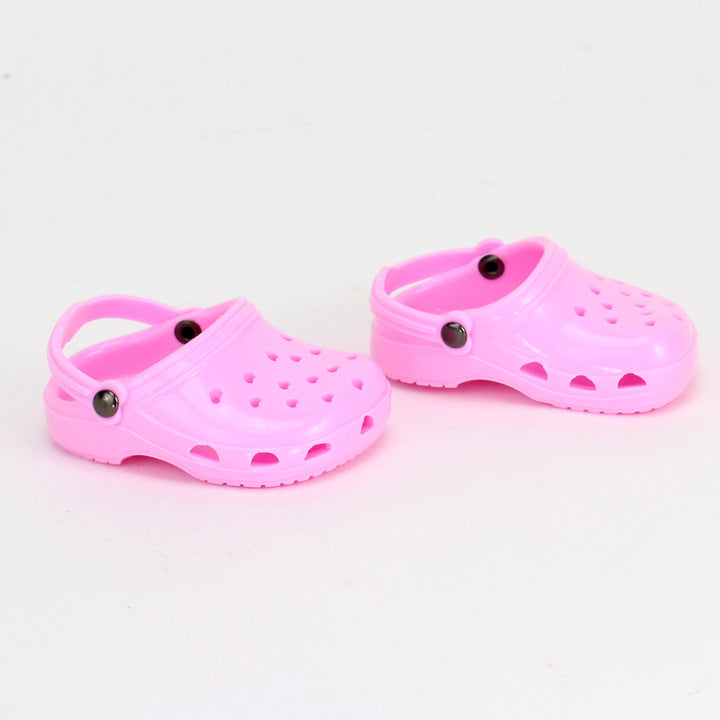 A pair of pink garden clogs for an 18" doll.