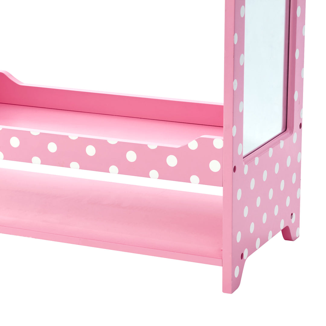 Close-up of two bottom shelves on a child's clothing rack