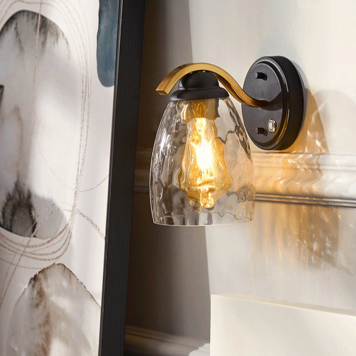 Close-up of an edison bulb in a Clear Hammered Glass Cloche Shade