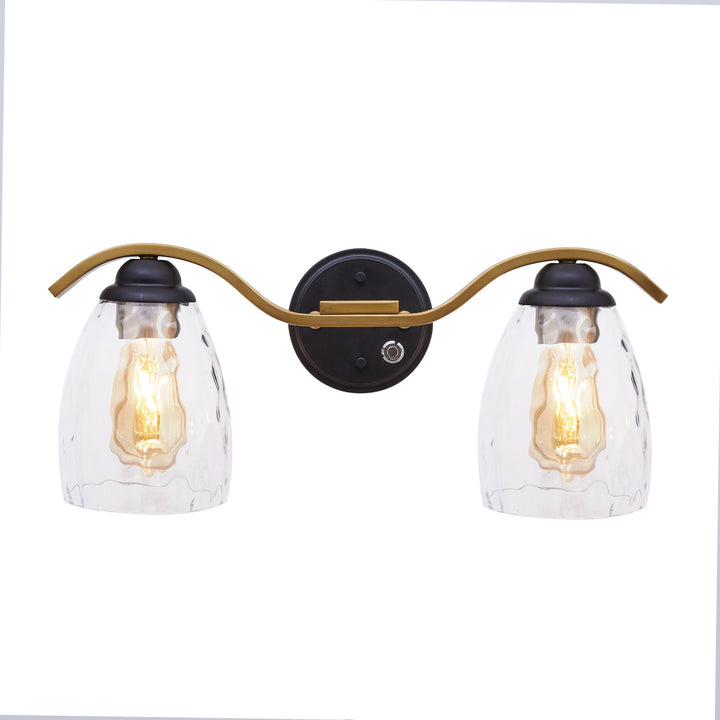 View of the three-stage dimmer on the backplate of the Teamson Home Heidi 2-Light Vanity Fixture with Clear Hammered Glass Cloche Shades, Black/Brass