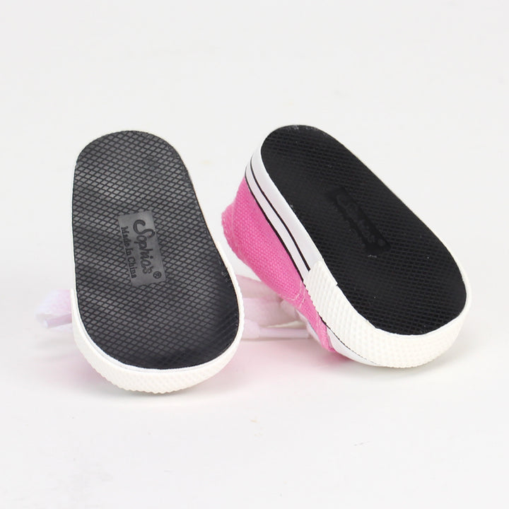 A pair of pink canvas sneakers for 18" dolls