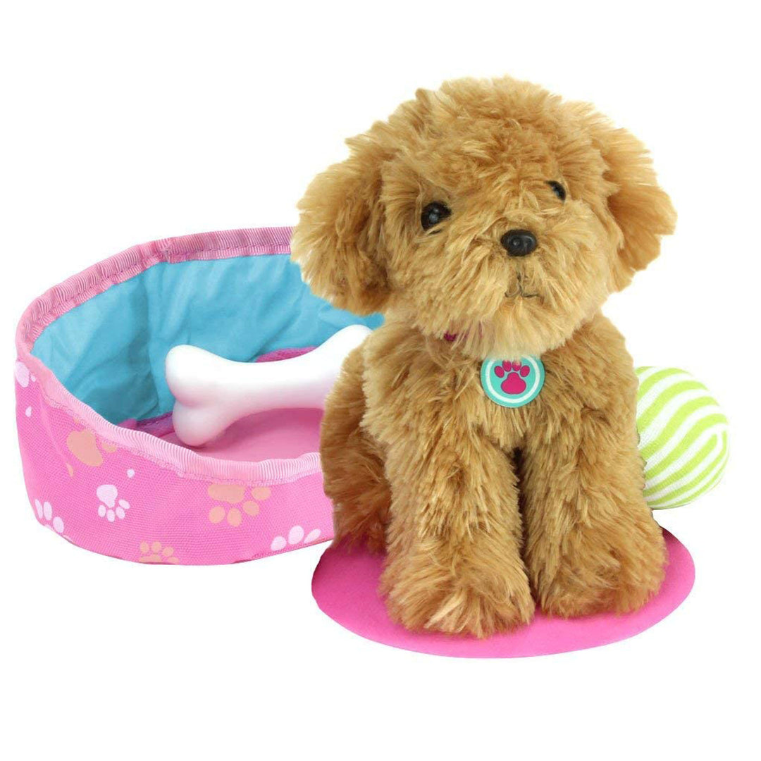 A Sophia's Plush Puppy and Accessories Set for 18" Dolls is sitting on a pink mat with a ball.