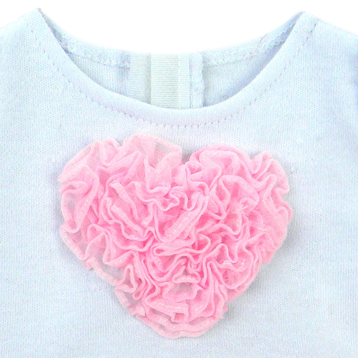 Close up of the pink tulle heart in the middle of the white tee.