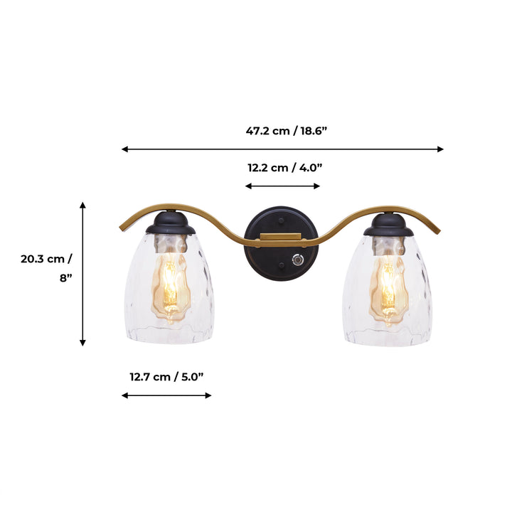 Dimensions in inches and centimeters of a Teamson Home Heidi 2-Light Vanity Fixture with Clear Hammered Glass Cloche Shades, Black/Brass